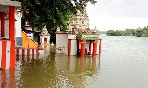 ಮಂಡ್ಯ| ಕಾವೇರಿ ನದಿಯಲ್ಲಿ ಪ್ರವಾಹ: ದೇವಾಲಯ, ರಸ್ತೆ, ಜಮೀನು ಜಲಾವೃತ