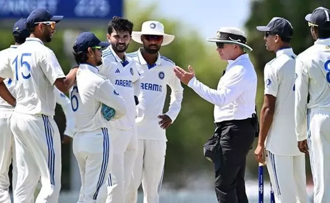 Photo of indian cricketers discussing with Umpire