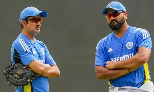 photo of Gambhir and Rohit Sharma