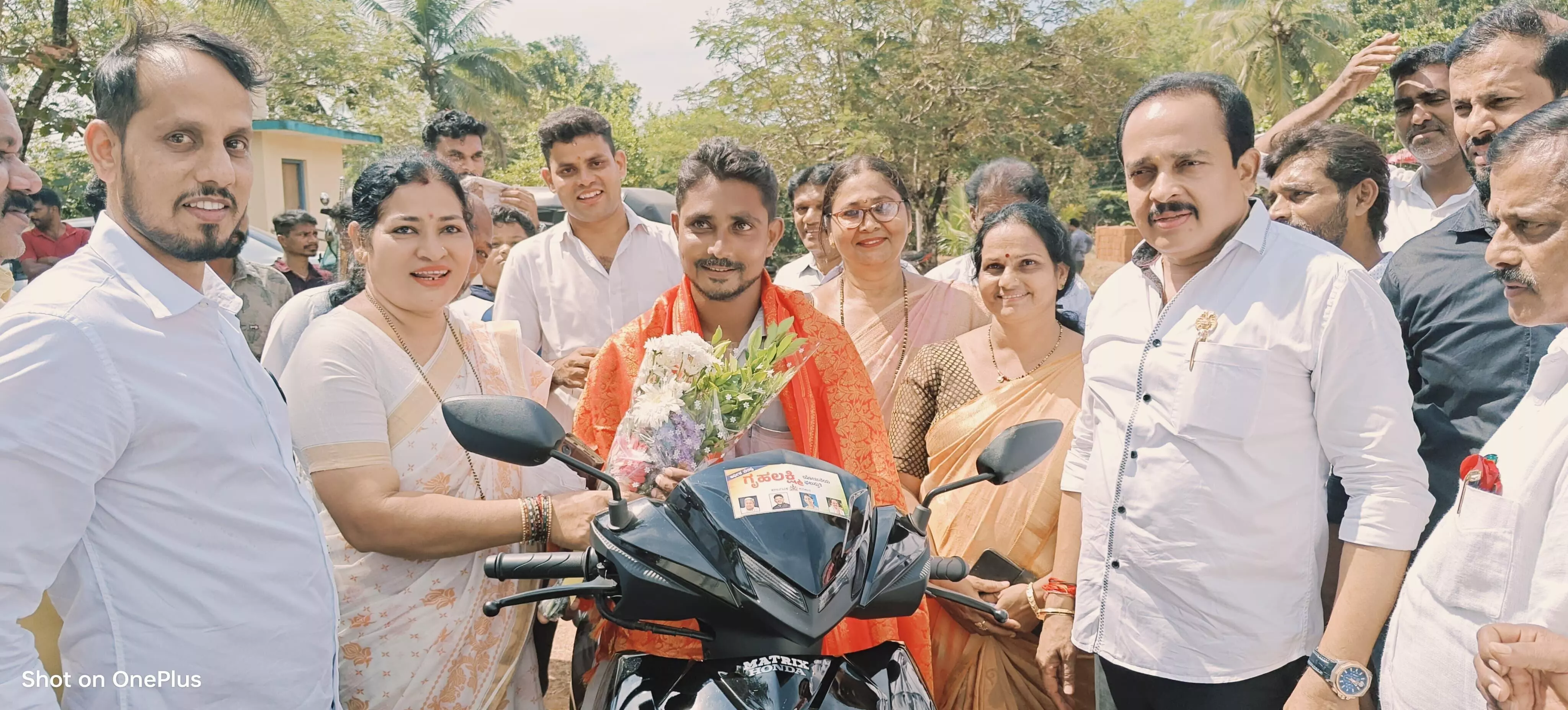 The wife gave her husband a scooter with the money of the Grihalakshmi
