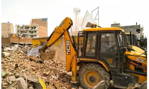 photo of  up with bulldozer to clear ‘encroachment