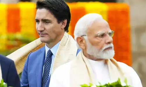 Photo of  Narendra Modi and Justin Trudeau