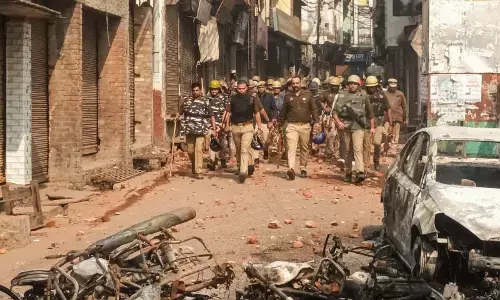 Police march past in violence hit Sambhal