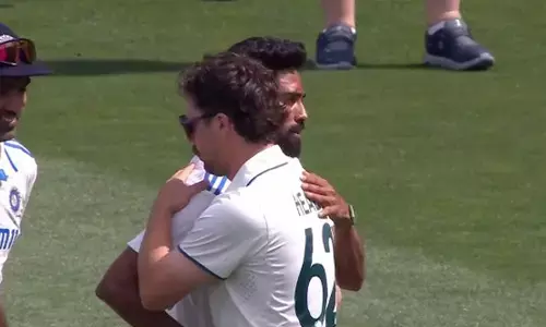 Photo of Siraj and Travis Head