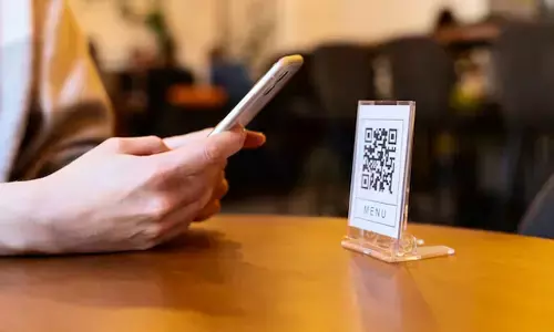 Person scanning qr code