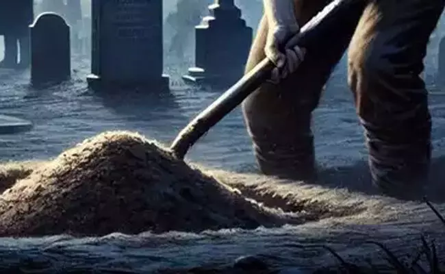 Photo of digigging grave Photo of digigging grave