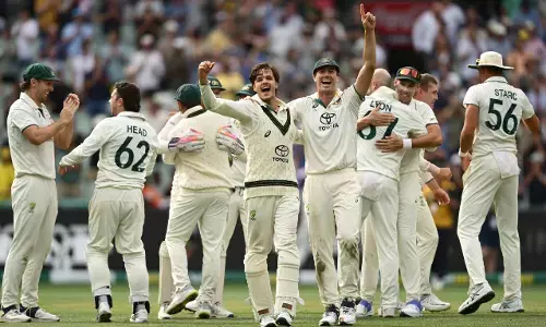 Team Australia celebrates victory against India during boxing day test