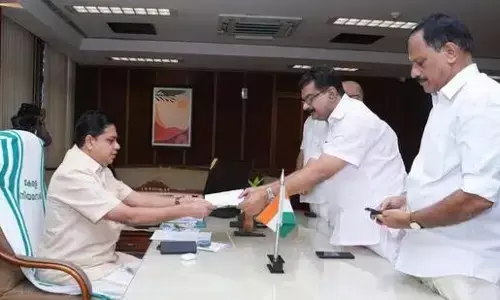 Photo of MLA Anwar submitting resigation letter