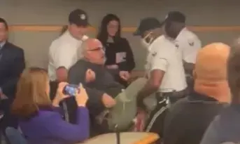 Photo of Journalist dragged