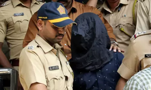 Police taking accused to court