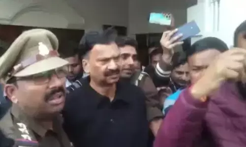 Photo of Congress MP arrested by police