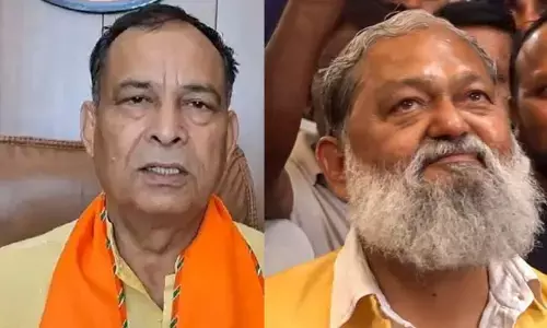 Photo of Mohan Lal Badoli and Anil Vij
