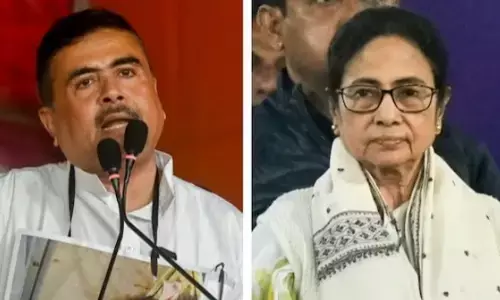 Photo of Suvendhu Adhikari and Mamata Banergee