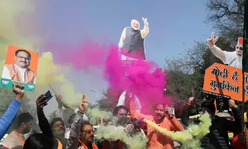 Photo of BJP workers celebrating victory in Delhi