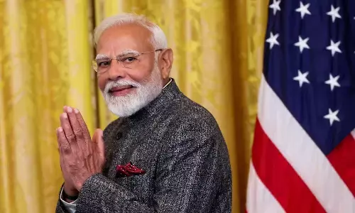 Prime Minister Narendra Modi gestures as he arrives for a joint press conference with US President Donald Trump at the White House in Washington, DC, US, February 13, 2025.