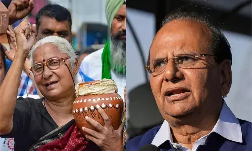 Medha Patkar, V K Saxena.