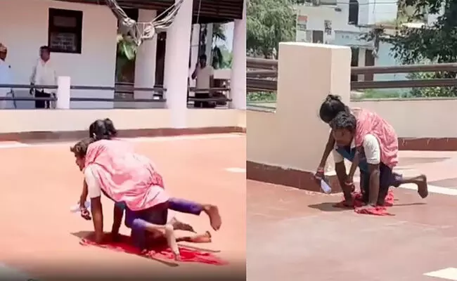 ಉತ್ತರಪ್ರದೇಶ | ರಸ್ತೆ ನಿರ್ಮಿಸುವಂತೆ ಆಗ್ರಹಿಸಿ ಪತ್ನಿಯನ್ನು ಬೆನ್ನ ಮೇಲೆ ಹೊತ್ತು ತೆವಳುತ್ತಾ ಡಿಸಿ ಕಚೇರಿಗೆ ಹೋದ ವಿಕಲ ಚೇತನ : ವೀಡಿಯೊ ವೈರಲ್