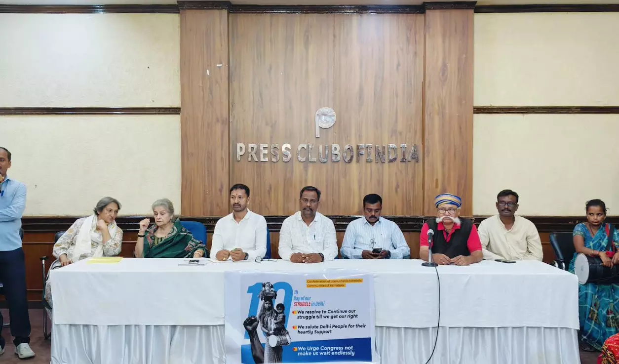 ಎಐಸಿಸಿ ಕದ ತಟ್ಟಿದ ಅಲೆಮಾರಿ ಸಮುದಾಯ | ನಾಳೆಯಿಂದ(ಅ.11) ಎಐಸಿಸಿ ಕಚೇರಿ ಆವರಣದಲ್ಲೇ ಅನಿರ್ದಿಷ್ಟಾವಧಿ ಧರಣಿ ಎಐಸಿಸಿ ಕದ ತಟ್ಟಿದ ಅಲೆಮಾರಿ ಸಮುದಾಯ | ನಾಳೆಯಿಂದ(ಅ.11) ಎಐಸಿಸಿ ಕಚೇರಿ ಆವರಣದಲ್ಲೇ ಅನಿರ್ದಿಷ್ಟಾವಧಿ ಧರಣಿ