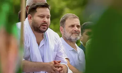 Congress leader Rahul Gandhi with RJD leader Tejashwi Yadav
