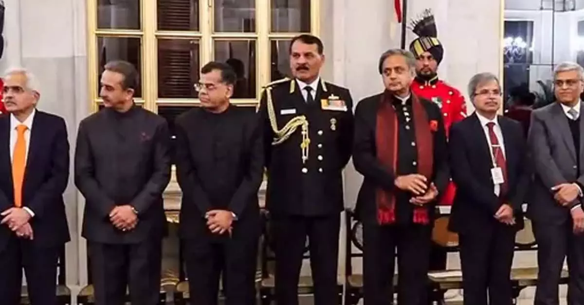 Chief of the Naval Staff Admiral Dinesh Kumar Tripathi, Congress MP Shashi Tharoor and other dignitaries during a state banquet at Rashtrapati Bhavan.