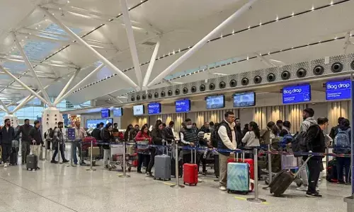 Passengers at Terminal 1 (T1) of the Indira Gandhi International Airport amid improvement in services following IndiGo flight disruptions, in New Delhi,