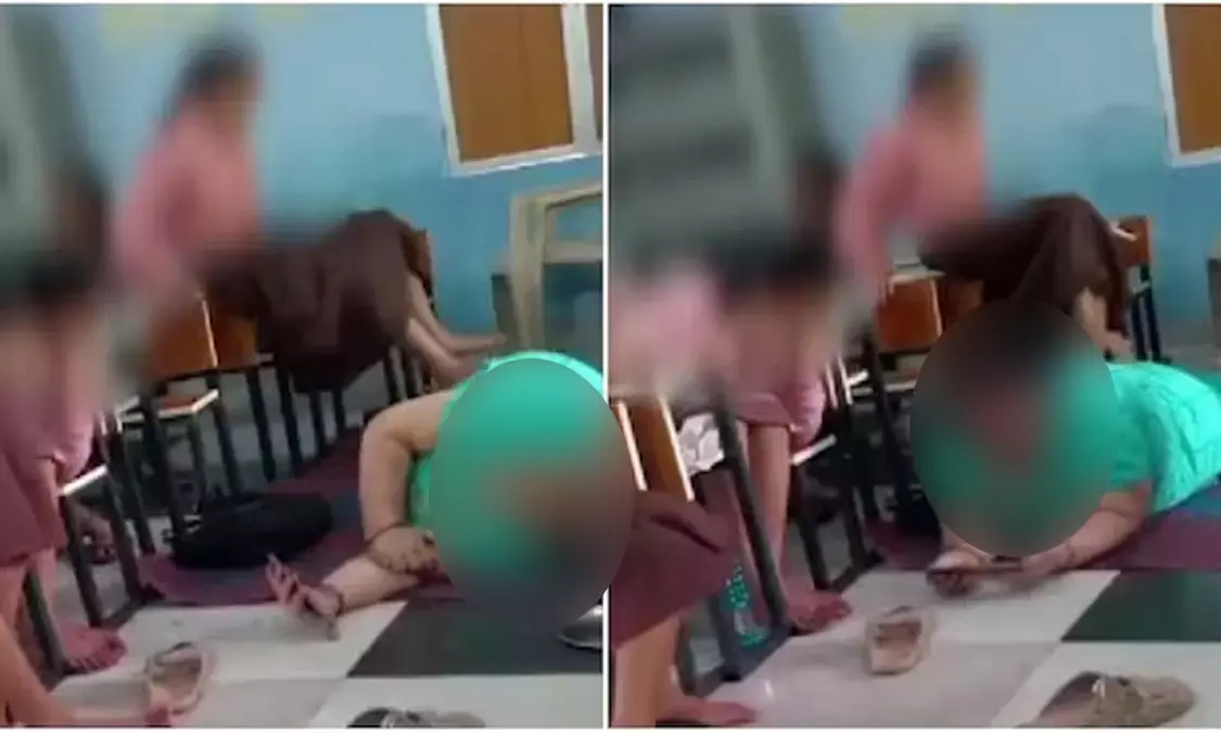 Uttar Pradesh | ತರಗತಿ ಕೊಠಡಿಯಲ್ಲೇ ಶಾಲಾ ಮಕ್ಕಳಿಂದ ಬಾಡಿ ಮಸಾಜ್ ಮಾಡಿಸಿಕೊಂಡ ಮುಖ್ಯೋಪಾಧ್ಯಾಯಿನಿ: ವಿಡಿಯೊ ವೈರಲ್