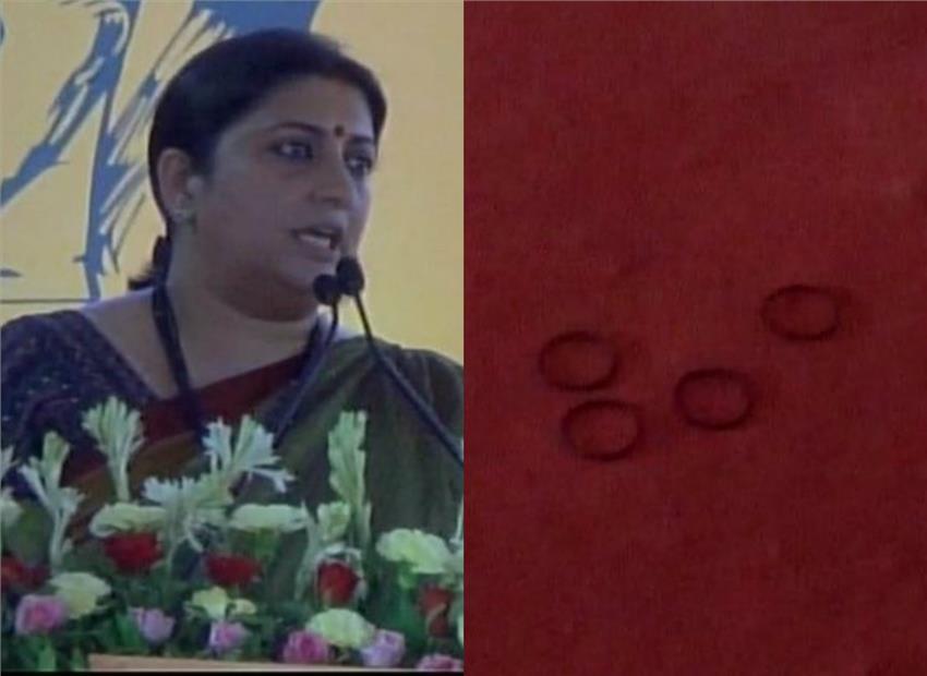 ಸಚಿವೆ ಸ್ಮೃತಿಗೆ ಬಳೆಯೆಸೆದು ‘ರೈತ’ನ ಪ್ರತಿಭಟನೆ