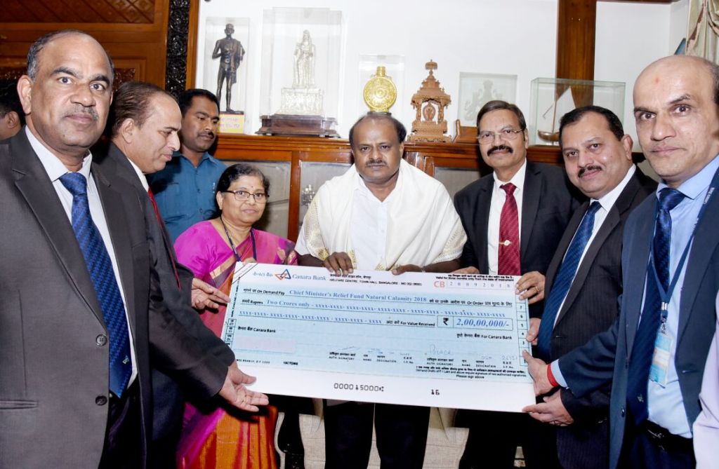 ಕೆನರಾ ಬ್ಯಾಂಕ್‍ನಿಂದ ಕೊಡಗು ಸಂತ್ರಸ್ತರಿಗೆ ರೂ.2 ಕೋಟಿ ಪರಿಹಾರ