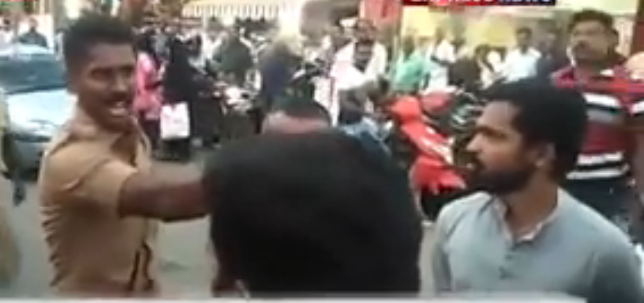 ನೀವು ಗಂಡಸರಾಗಿದ್ದರೆ ಬಸ್ಸನ್ನು ಮುಟ್ಟಿ: ಪ್ರತಿಭಟನಕಾರರಿಗೆ ಸವಾಲೆಸೆದ ಪೊಲೀಸ್ ಅಧಿಕಾರಿಯ ವಿಡಿಯೋ ವೈರಲ್