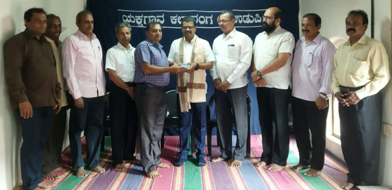 ಉಡುಪಿ: ಯಕ್ಷಗಾನ ಕಲಾವಿದರಿಗೆ ಬಸ್‌ಪಾಸ್ ವಿತರಣೆ